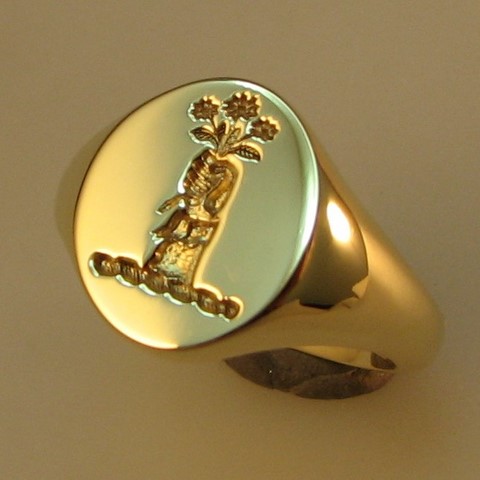 hand holding bunch of flowers crest ring