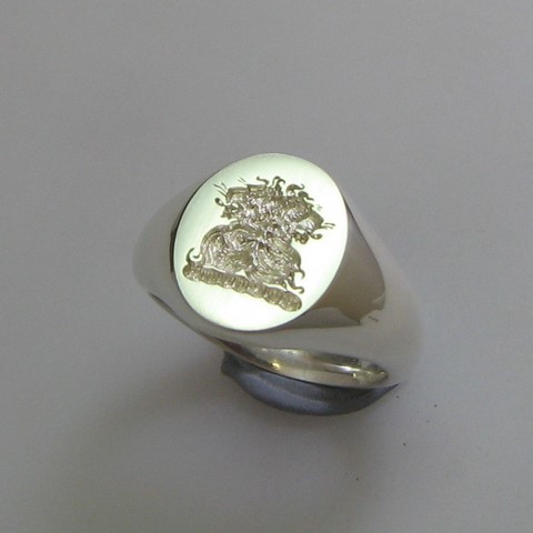 Two headed lion crest engraved signet ring