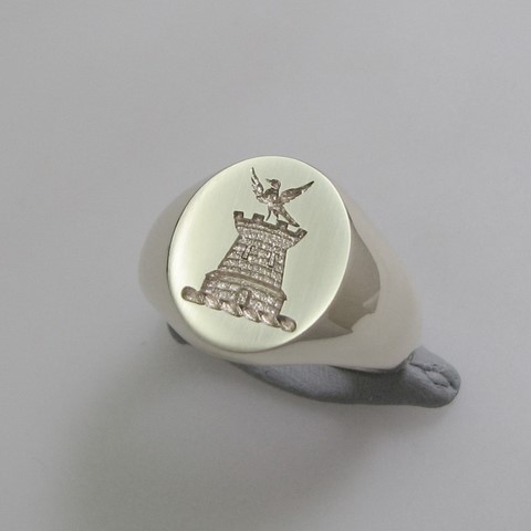 Bird on turret castle engraved signet ring