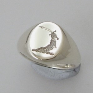 Armoured arm with cutlass crest engraved signet ring